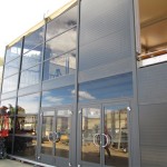 Glass wall panels for temporary structures