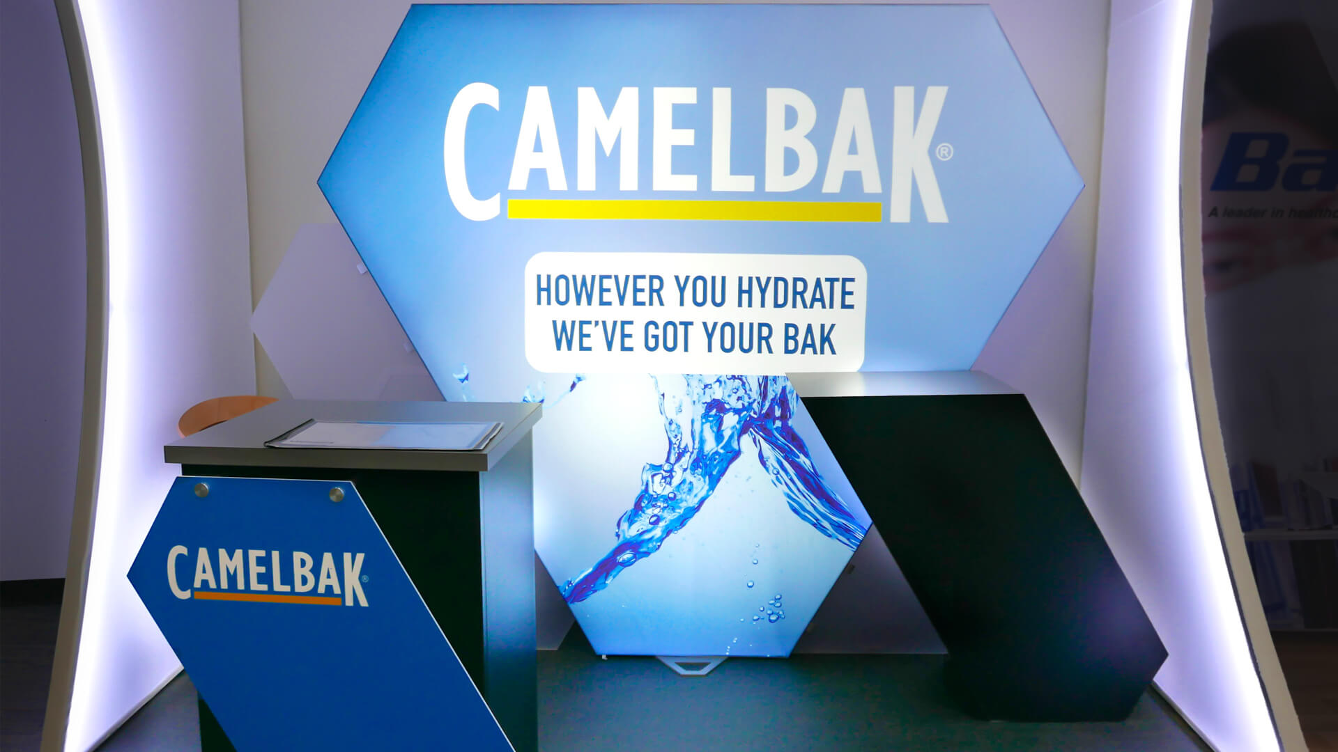 Camelback portable trade show booth by Condit