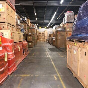 crates in a warehouse aisle